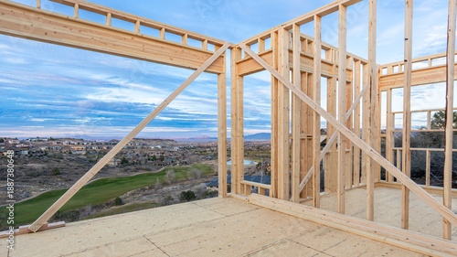 Foto Residential House Framing at Construction Site with Scenic Background