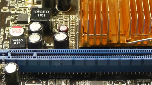 A close-up view of a computer motherboard and its components