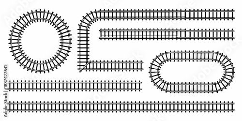 A collection of black railway tracks arranged in various curved and straight sections