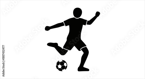 Silhouette of a Soccer Player Kicking a Ball During a Match