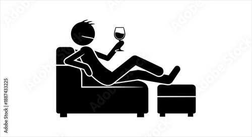 Comfortable person enjoying quiet leisure time with a drink in their own home