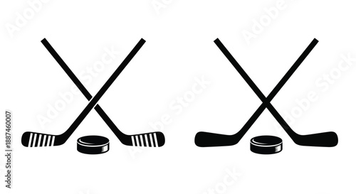 Two crossed hockey sticks and pucks in a dark silhouette