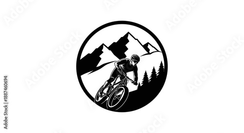 Mountain biker riding downhill on a trail.