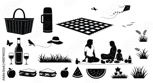 Family enjoying a picnic in the park with kite and food