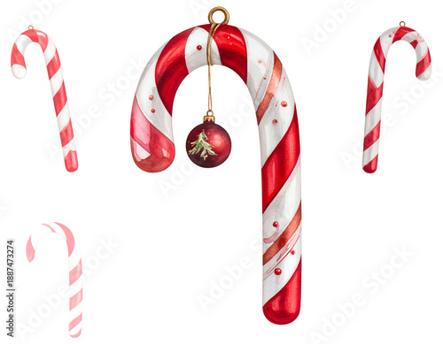 Festive candy canes and bauble against dark background