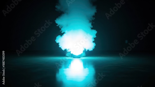 Turquoise smoke and light beam effects on a dark, reflective surface