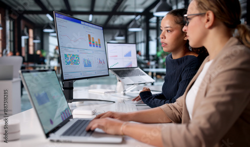 Canvastavla Financial Analysts: Woman Examining Dashboard Data