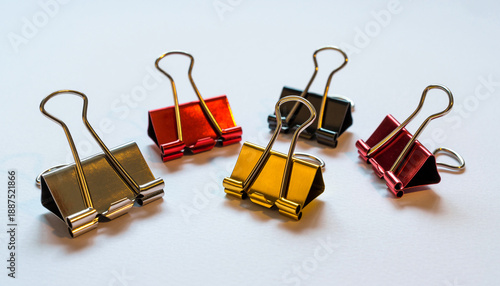Collection of colorful binder clips for office and crafts