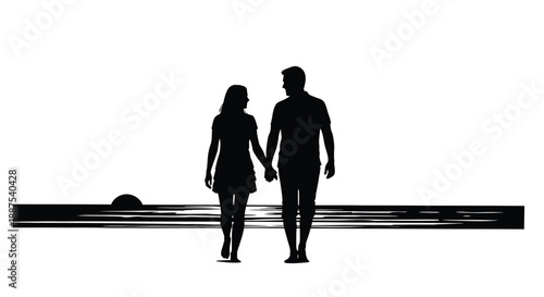 Couple walking hand in hand by the water
