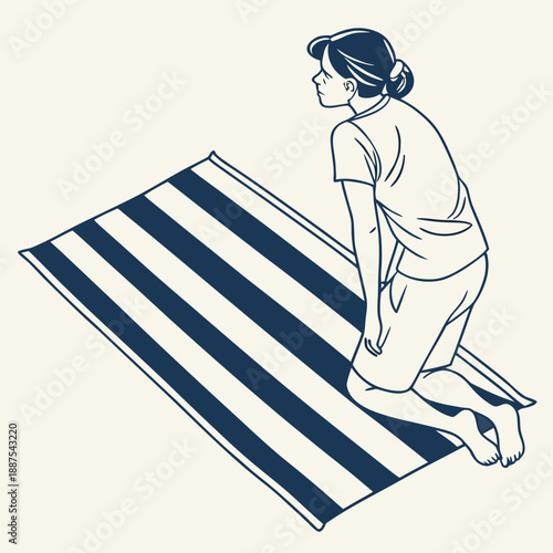 Woman kneeling on striped rug