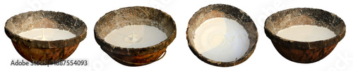 Obraz na płótnie Fresh liquid rubber latex sap in a rustic collection bowl with a splash drop, isolated on transparent background