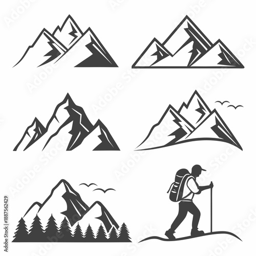 Mountain silhouettes and hiker