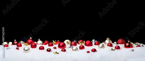 Festive Christmas Ornaments on Snow Border