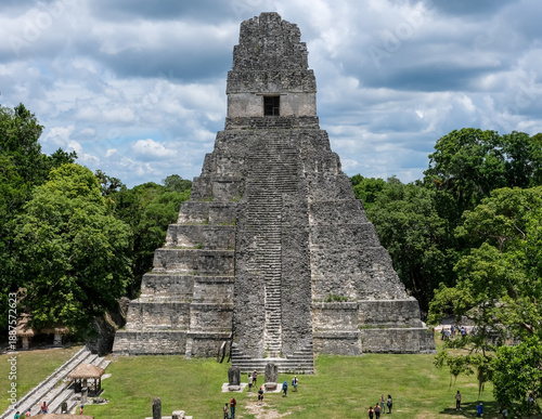Tikal, Guatemala – Frontal view of Temple I (Great Jaguar Temple) photographed from the top of Temple II, overlooking the Great Plaza, the ceremonial core of Tikal, one of the most powerful and influe