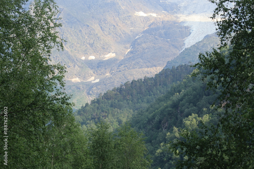 Obraz premium Mountain landscape of the North Caucasus mountains near Mount Elbrus on a sunny summer day