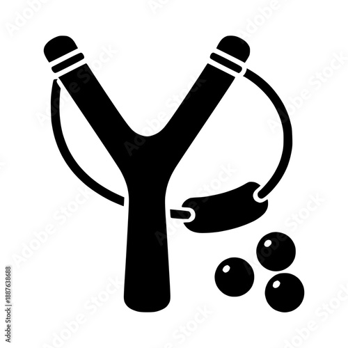 Classic wooden slingshot with ammunition balls