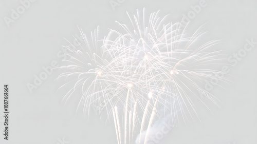 Multiple Bright White Fireworks Bursting Against a Pale Sky, Creating a Subtle Yet Festive Display for Celebratory Events