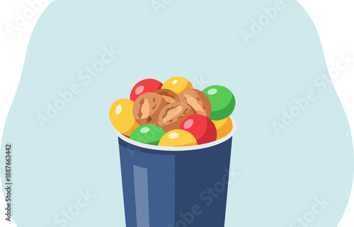 A dark blue cup overflows with colorful round candies and nuts