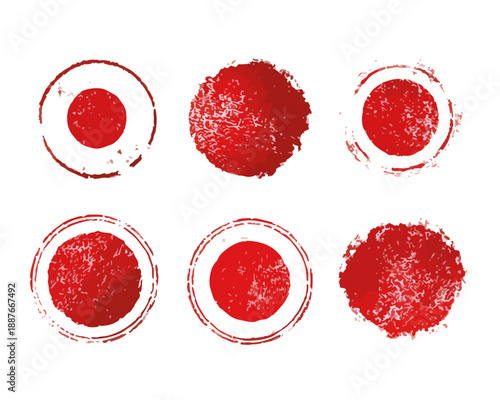 Zestaw sześciu czerwonych, okrągłych stempli w stylu grunge, symbolizujących japońską flagę na białym tle.