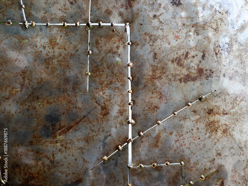 Texture of slightly rusty steel sheet with spot welding elements