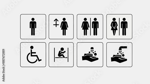 Collection of restroom and accessibility signs.