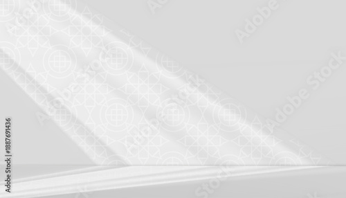 Islamic background.Shadow Arabic pattern window light on grey wall and floor.Minimal white studio background for Ramadan Kareem,Eid al Fitr,Mosque interior.Elegant Islamic product display