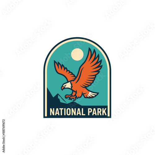 Stylized emblem for a national park featuring a soaring eagle beneath a full moon with mountain backdrop in a minimalist design
