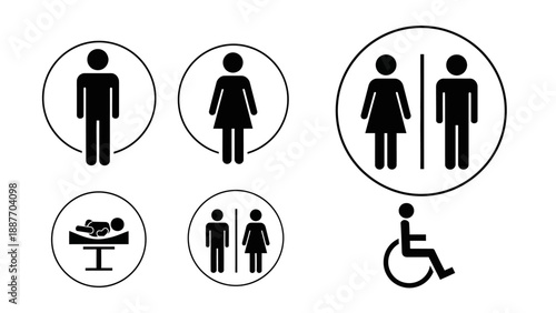 Collection of restroom and accessibility signs.