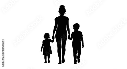 Mother and two children silhouette walking together holding hands.