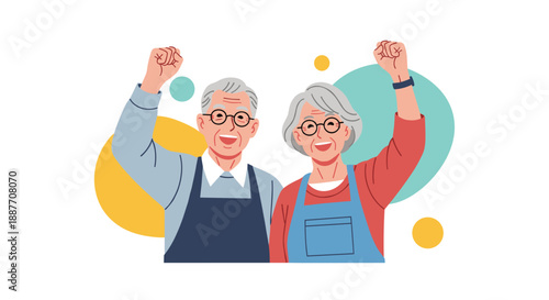 Joyful senior couple wearing aprons and glasses raise their fists in a gesture of success and happiness against a colorful background.