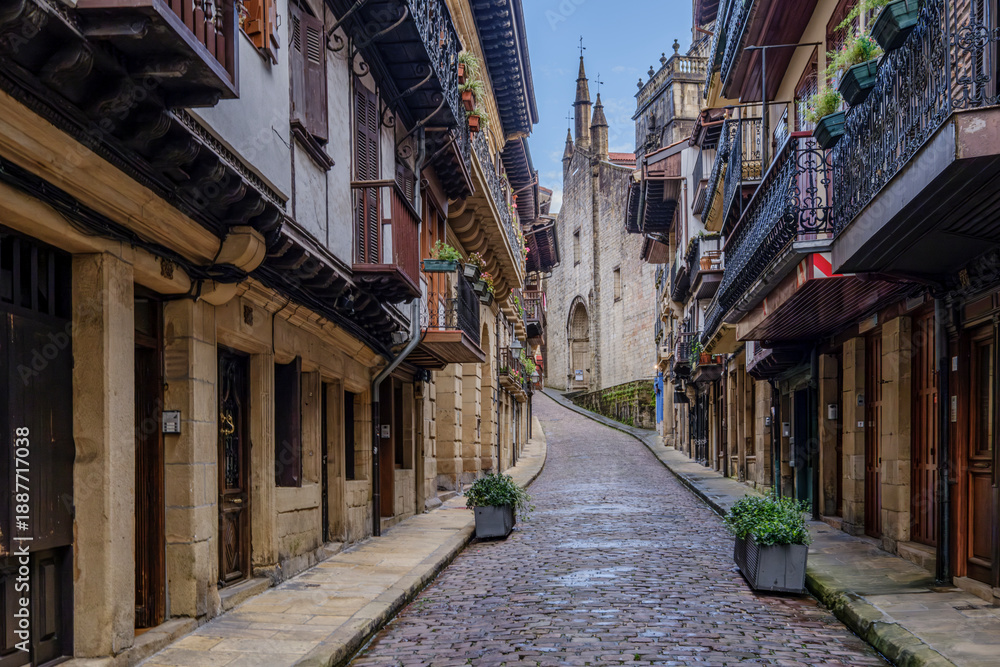 Fototapeta premium Main Street Of Hondarribia With Santa Maria Del Manzano Church, Spain, Traditional Houses