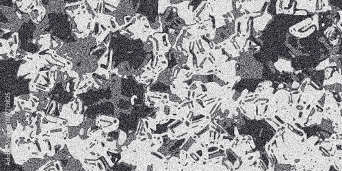 Detailed monochrome abstract pattern with fragmented organic shapes and grainy texture resembling cellular structures or geological formations