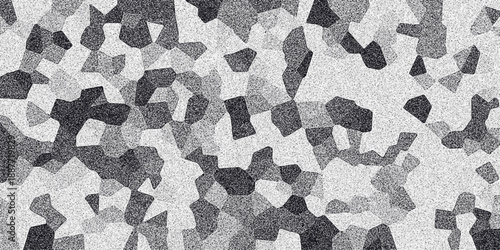 Abstract mosaic pattern with granular texture and varying shades of gray creating a dynamic and textured background for design projects