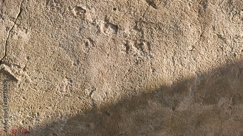 Rough Textured Sandstone Wall with Shadow
