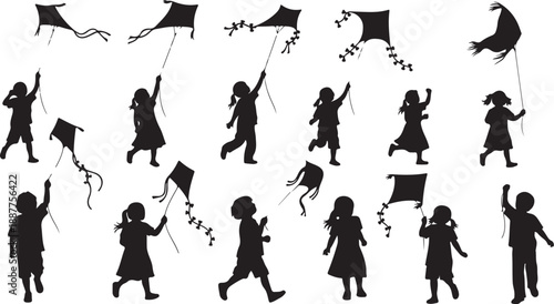 Children flying kites in playful joyful outdoor activity together