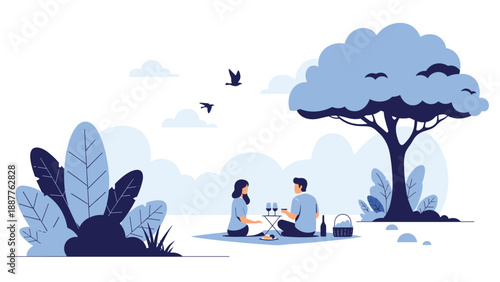 Romantic couple enjoying a peaceful picnic under a large tree in a beautiful park with wine and snacks during a sunny afternoon.