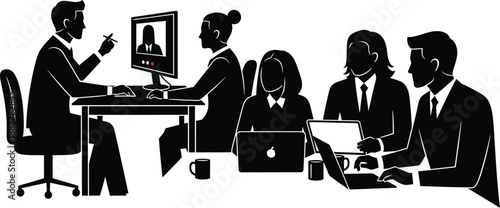 Business team members participate in a virtual meeting using a desktop computer monitor while others work on laptops in a modern office setting.