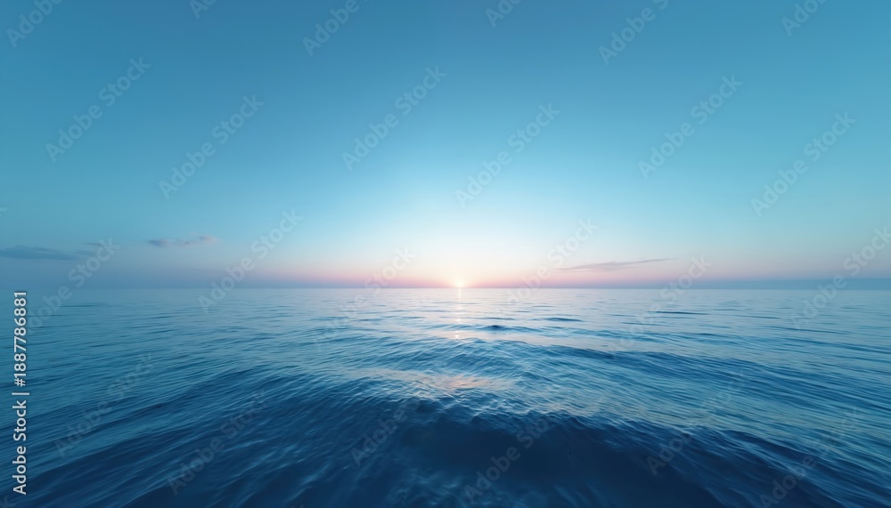 Obraz premium Vast ocean expanse under clear sky at sunrise. Gentle waves ripple on water surface, horizon glows with soft sun light. Peaceful sea landscape, nature beauty unfolds.