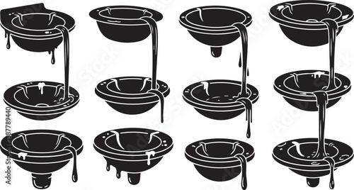 Various Black Bowls with White Outlines on Stands Displayed