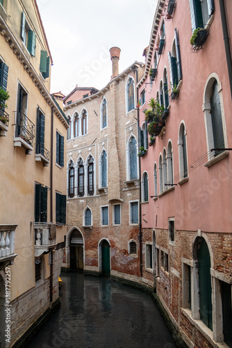 Fotografie Colorful historical houses and buildings at small canals in Venice, a city in Italy