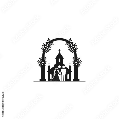 Wedding couple standing in church doorway.