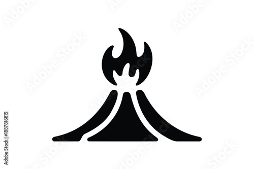 Black silhouette of erupting volcano with flames eruption