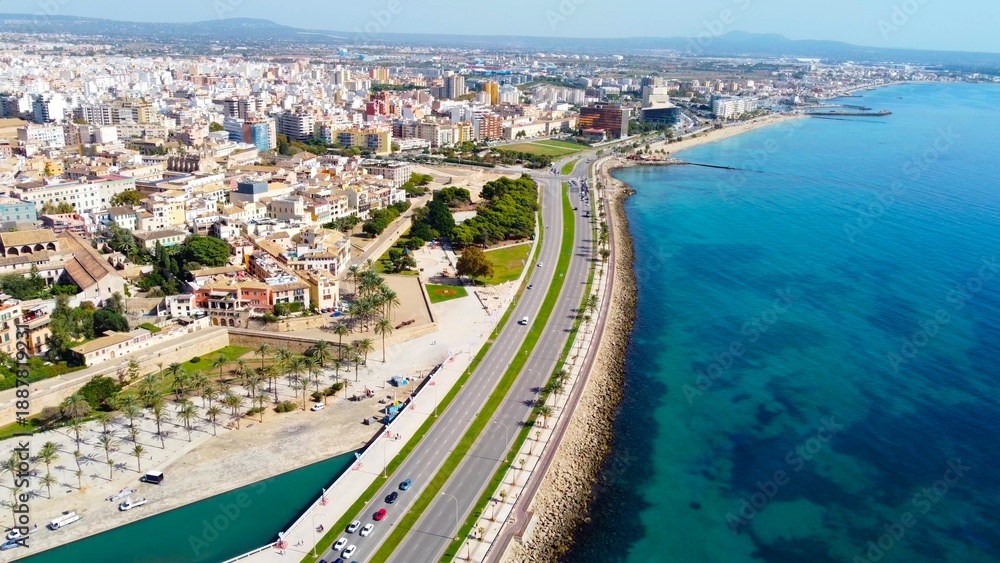 Fototapeta premium Embankment by the beach with road at day in tropic Palma de Mallorca