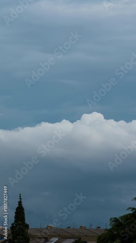 Wallpaper Mural Vertical video - Timelapse of thick clouds rolling over Bandung city, Indonesia Torontodigital.ca