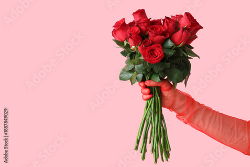 Female hand in glove with b...
