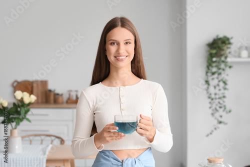 Beautiful young woman with ...