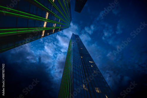 Canvas Print Close-up of Moscow City skyscraper with dramatic stormy sky at dusk