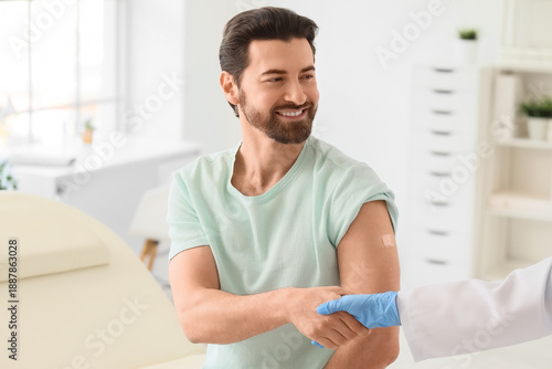 Young man with applied medi...