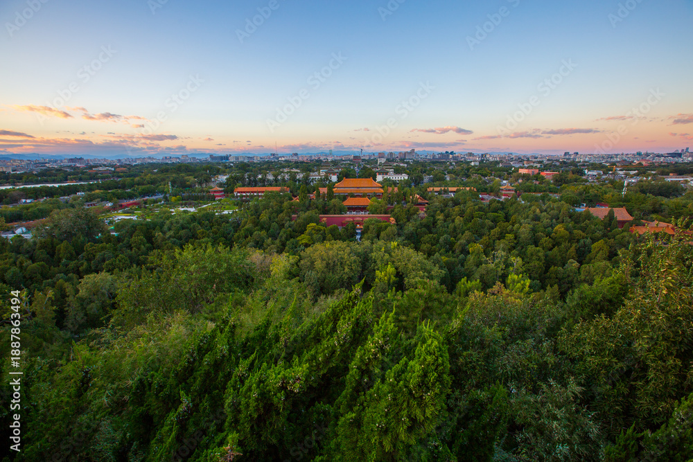 Fototapeta premium Overlooking the central axis and forest of architectural complexes in Jingshan Park, Beijing, China