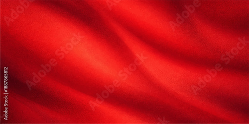 Smooth flowing red silk and satin fabric creates a luxury textile background with a shiny wave texture and romantic drapery for a soft velvet valentine backdrop